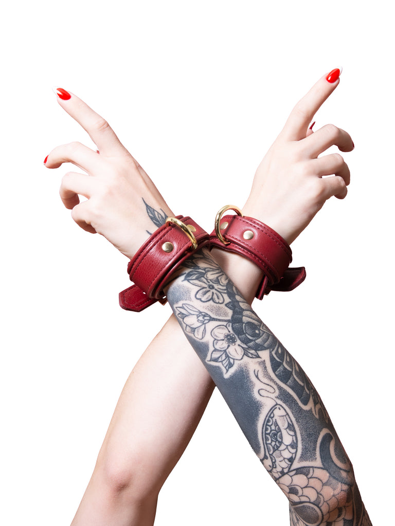 Burgundy Leather Wrist Cuffs With Gold Hardware